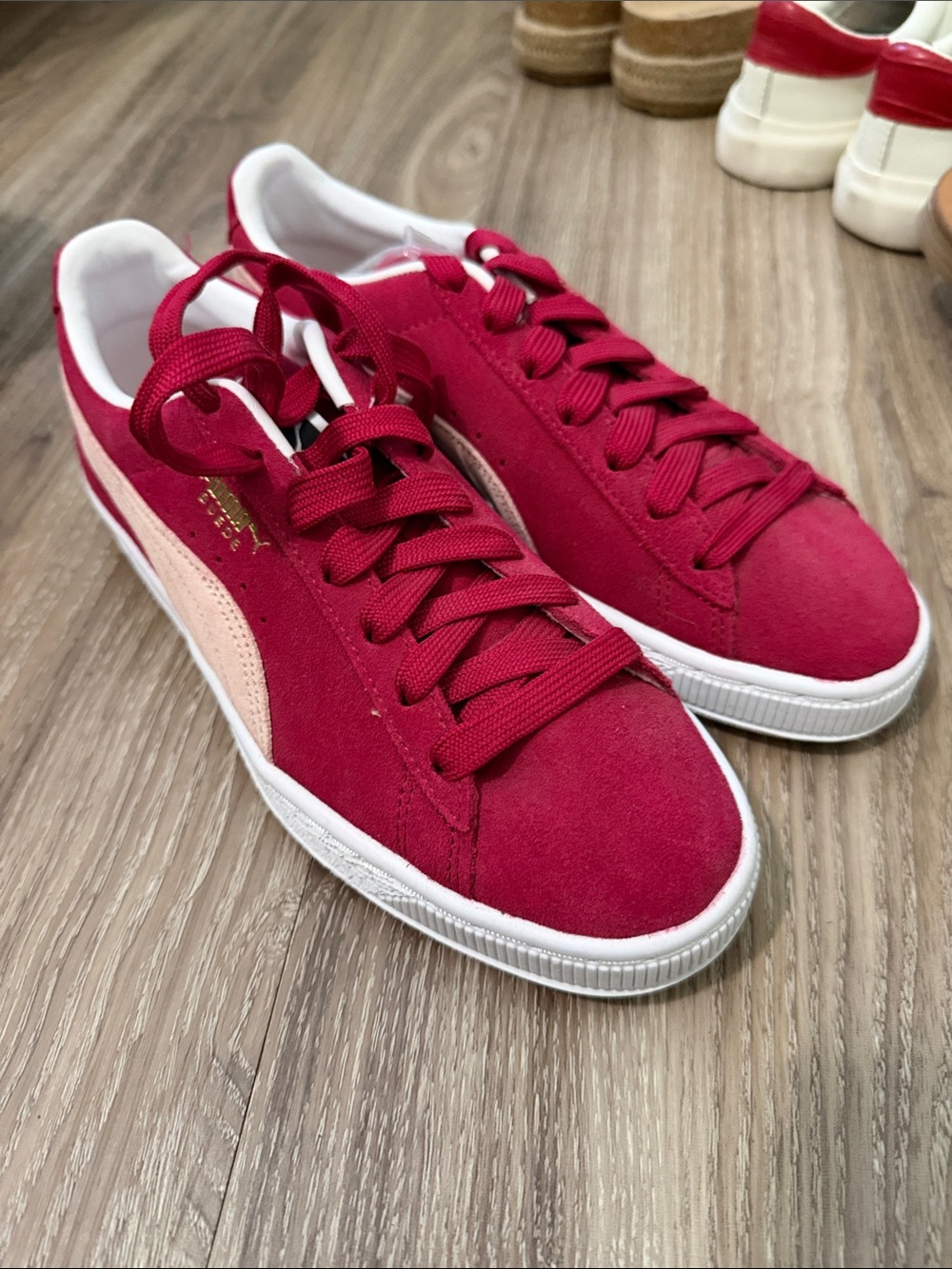 Puma Suede Sneakers in Berry Red with Light Pink Stripe